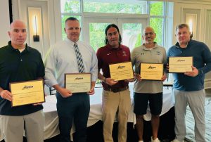 five athletic directors holding up awards