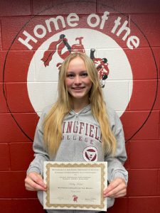 student with long blonde hair holding certificate