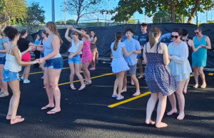 students dancing outside